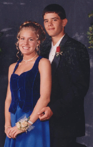 English teacher Mr. Seth Knight, pictured here at his  senior prom with social studies teacher, Mrs. Allison Roberts, graduated from Dunbar in 1997.