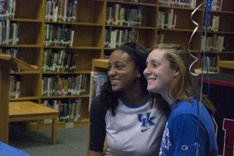 Leah Edmond and Madison Winstead smile after signing their National Letters of Intent.