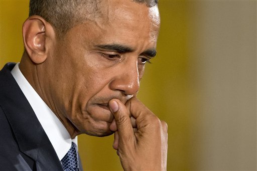 An emotional President Obama addressing new gun regulations.