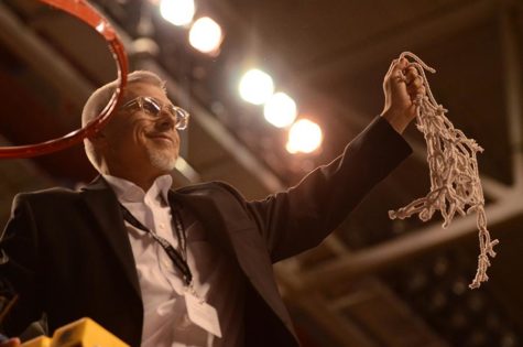 Coach Scott Chalk held the nets at Rupp Arena after winning his first state title