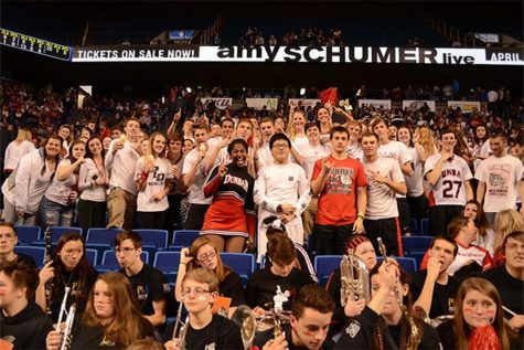 Members of the Dog Pound cheer on the Bulldogs