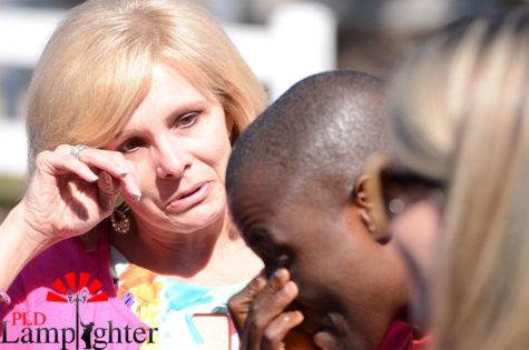 Mrs. Cathy Yaun cries as she sees Raphael beaming at his new car