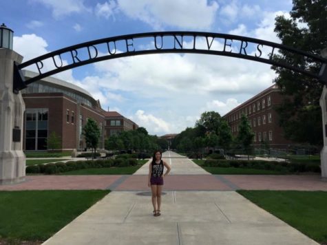Senior Amy Wang poses in front of Purdue University 