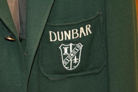 A symbol of the original Dunbar high school on the schools traditional green jackets.