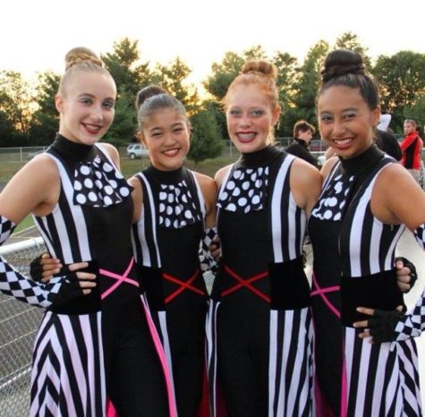 Claire Rich, Kyoko Hamagata, Ashley Verdi and Arunmani Phravorachith at a home football game.