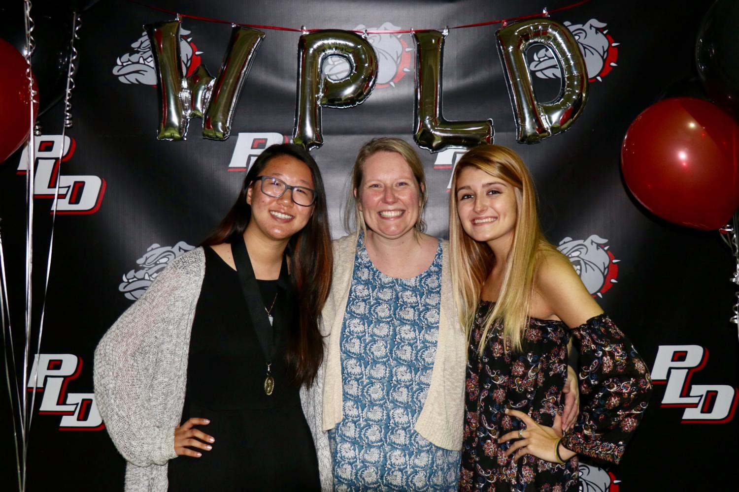 Editors-in-Chief Emily Liu and Brooke Bledsoe with Lamplighter advisor Wendy Turner