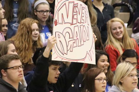 Dunbar students held up signs up support at the walk-out assembly on March 14.