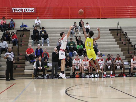 Bulldogs Lose Season Opener to Woodford County