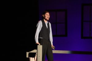 Senior Max Taylor performing as the lead character, Jack Kelly. 