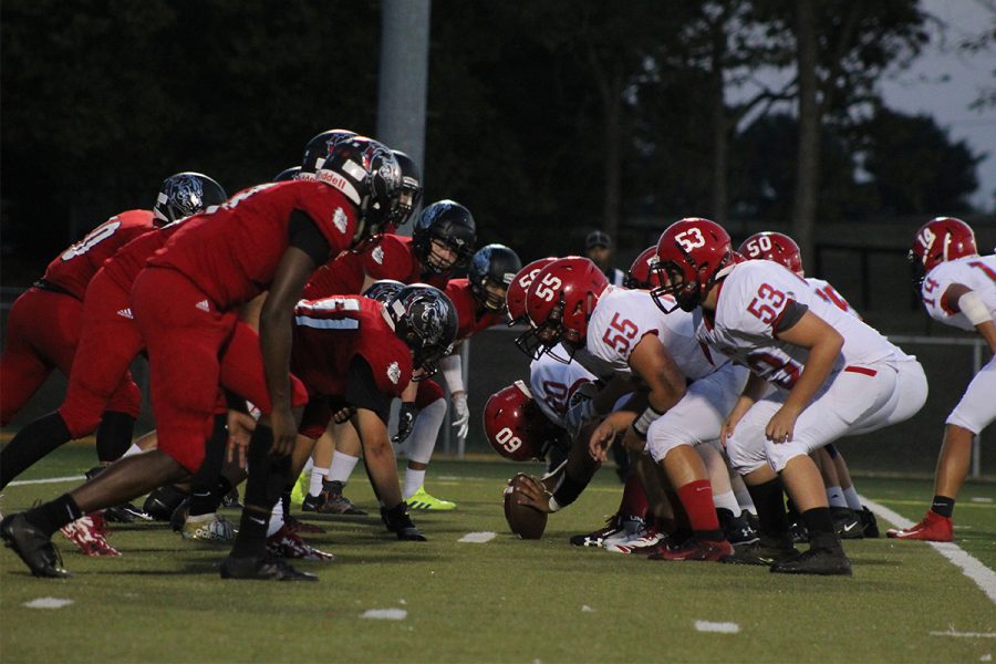 The Dunbar Bulldogs and the West Jessamine Colts faced off for the first down.
