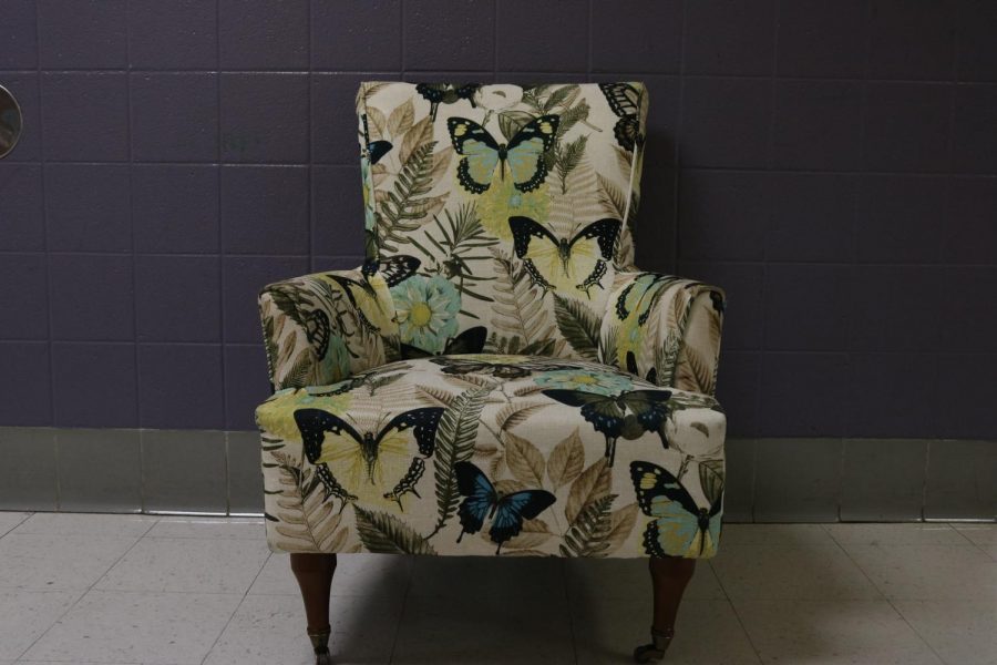 Students in Tara Wilkinsons creative writing class sit in the famed butterfly creative writing chair to share their pieces.