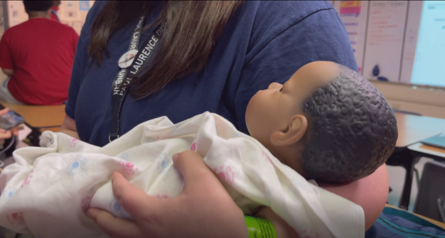 Students in the Parenting class were given infant simulator dolls to care for as part of a class project.