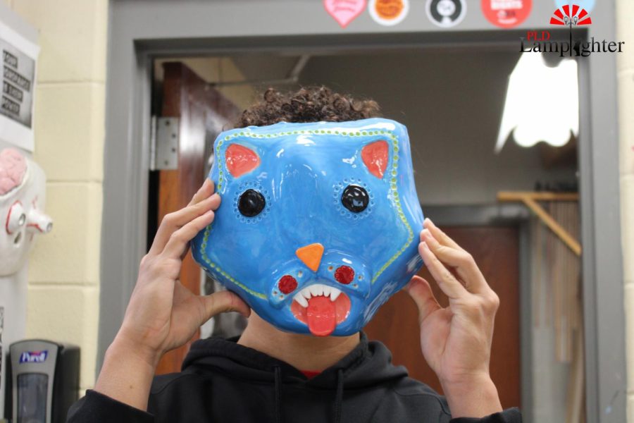 The masks the students make in the pottery class are life-size and can be used as something to wear.