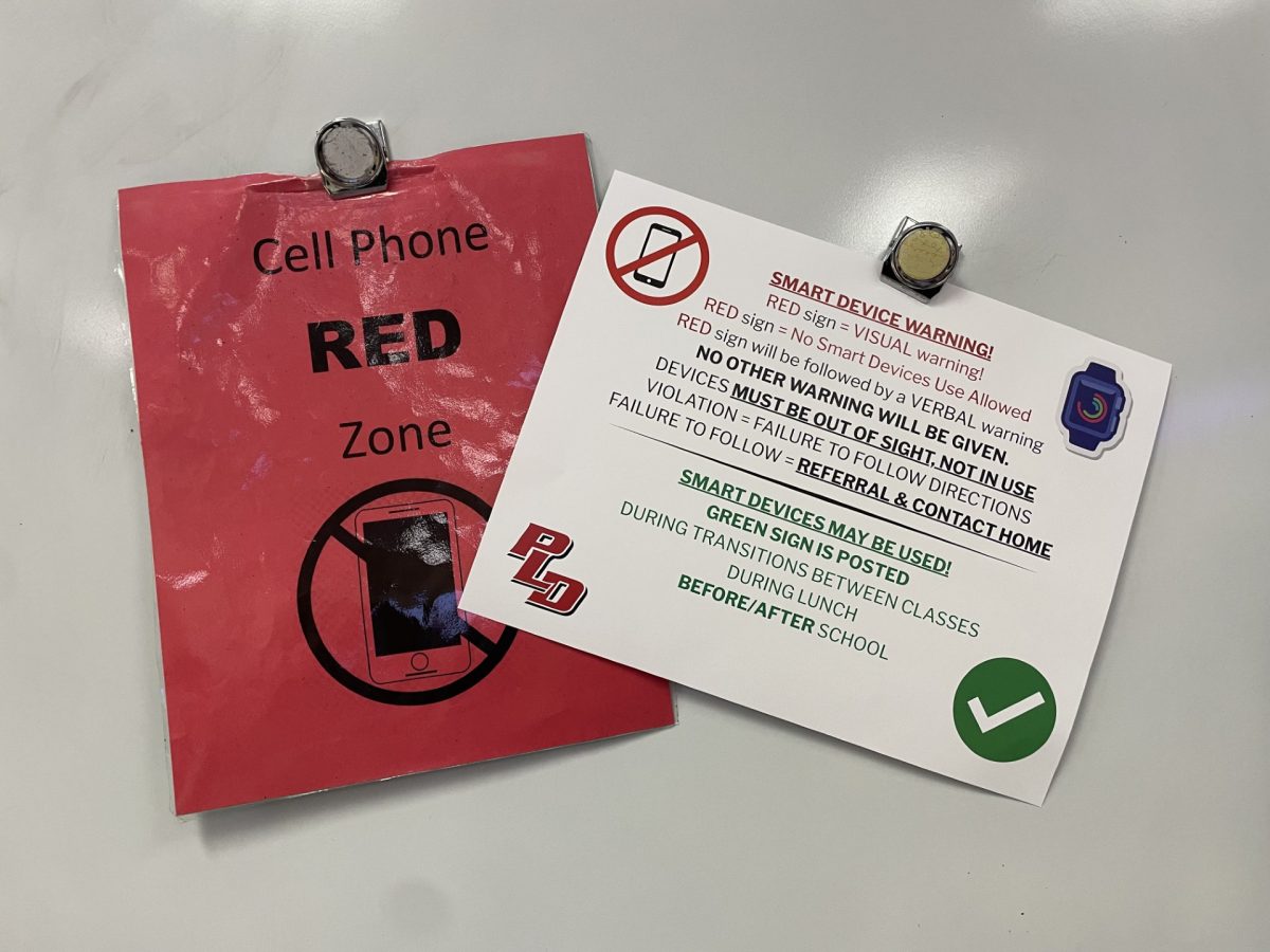 Dunbar uses a system of signs that are either red or green based on the areas where phones are permissible.