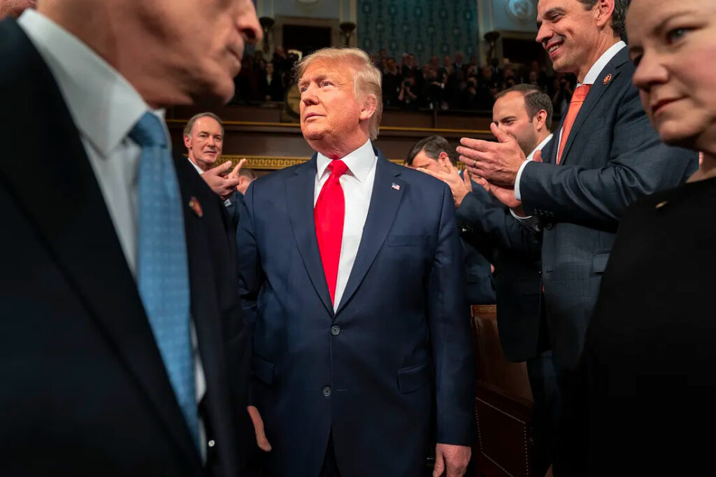 President Donald Trump is greeted the chamber prior to his State of the Union address.